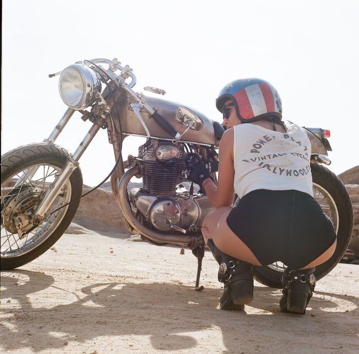 A playful frame from Girls on a motorcycle — online in Zagreb
